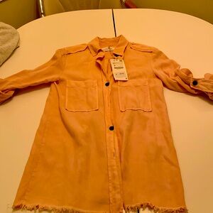 Peach button down top